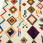 Ivory Azilal rug Tamuda with multicolor diamond mosaic, pattern detail