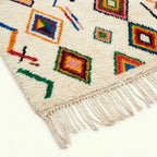 Ivory Azilal rug Tamuda with multicolor diamond mosaic, wool texture detail