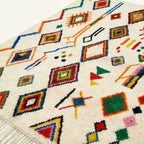 Ivory Azilal rug Tamuda with multicolor diamond mosaic, border detail