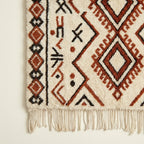 Ivory Azilal rug Tazirit with rust diamond border, wool texture detail