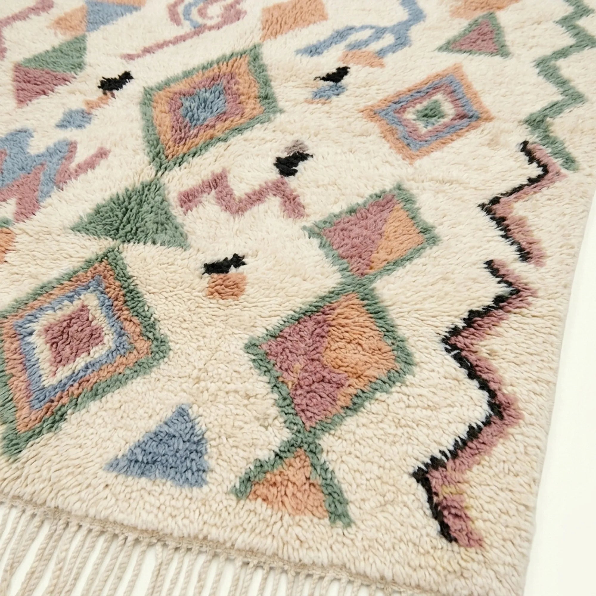 Ivory Azilal rug Tigmi with pastel diamond grid, fringe detail