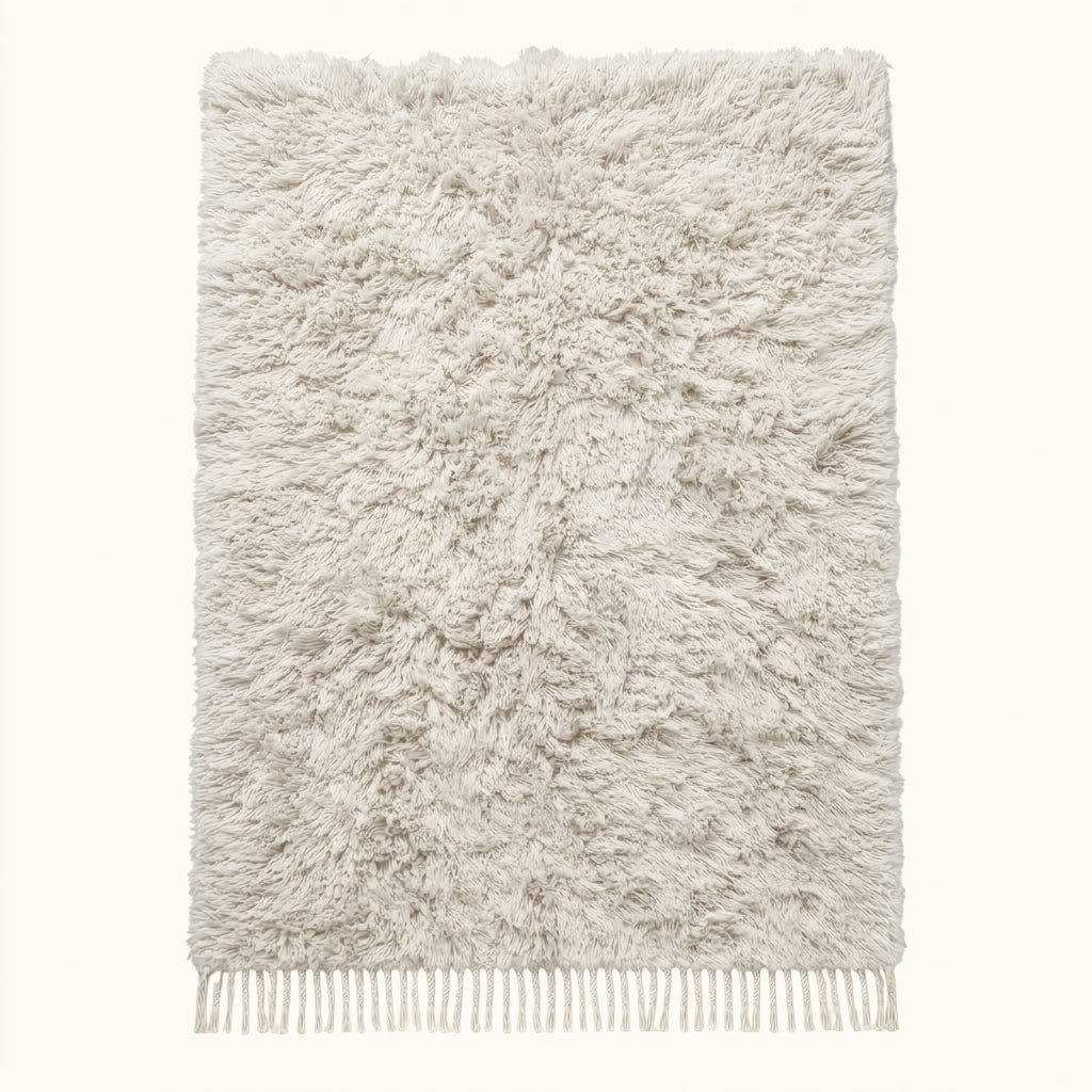 Ivory Beni Ourain Rug – Textured Pile – Kella, flat lay on neutral background showing thick wool pile and fringe