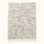 Ivory Beni Ourain Rug – Textured Pile – Kella, flat lay on neutral background showing thick wool pile and fringe