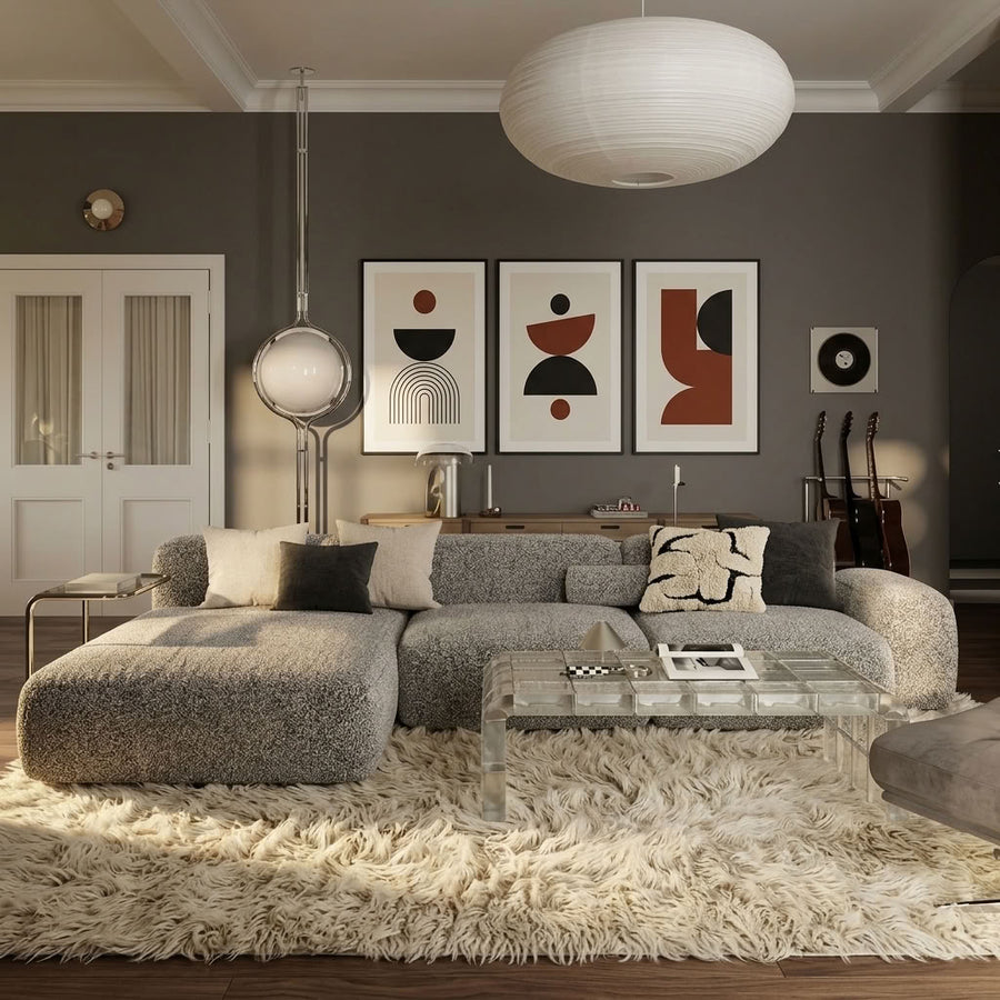 Ivory Beni Ourain rug in modern living room setting with curved grey sofa and abstract wall art