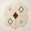 Ivory Beni Ourain rug with brown diamond lattice, full flat view showing irregular organic edges