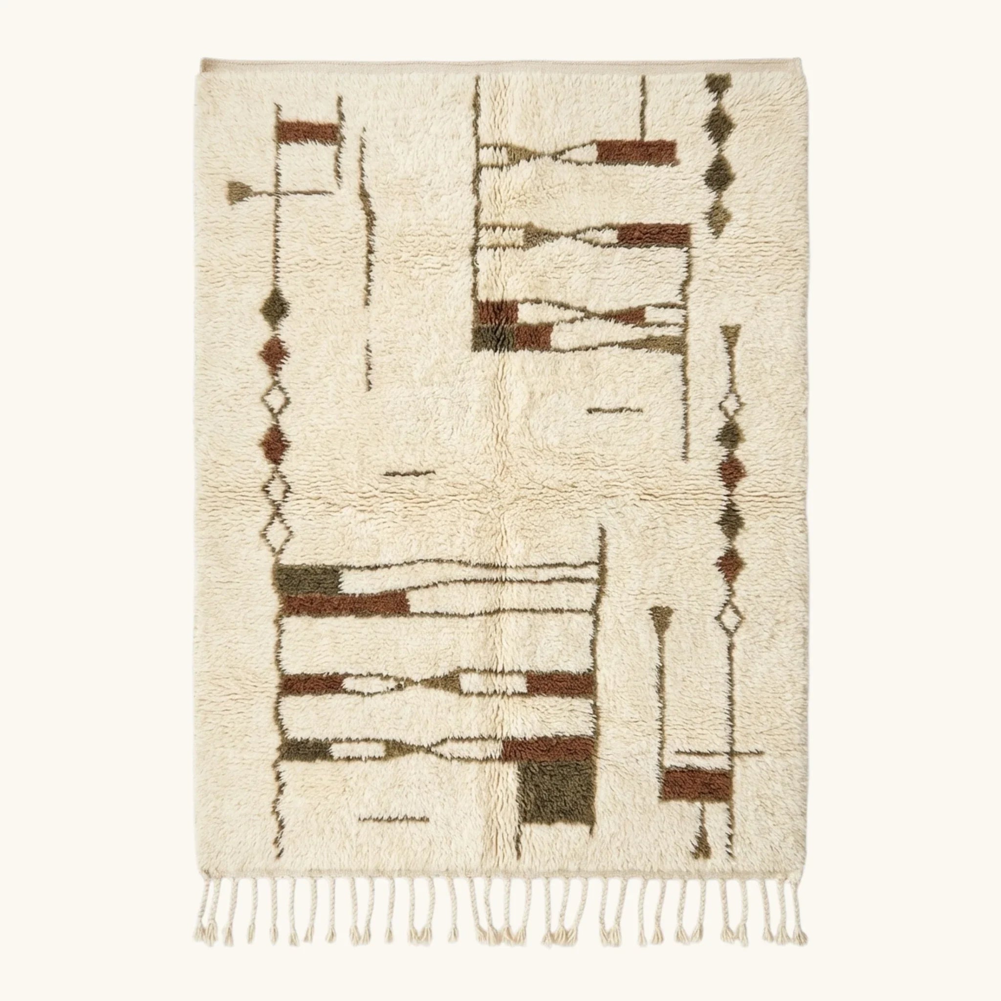 Full view of the Tinmel ivory, brown and olive Beni Ourain rug with an abstract linear design.