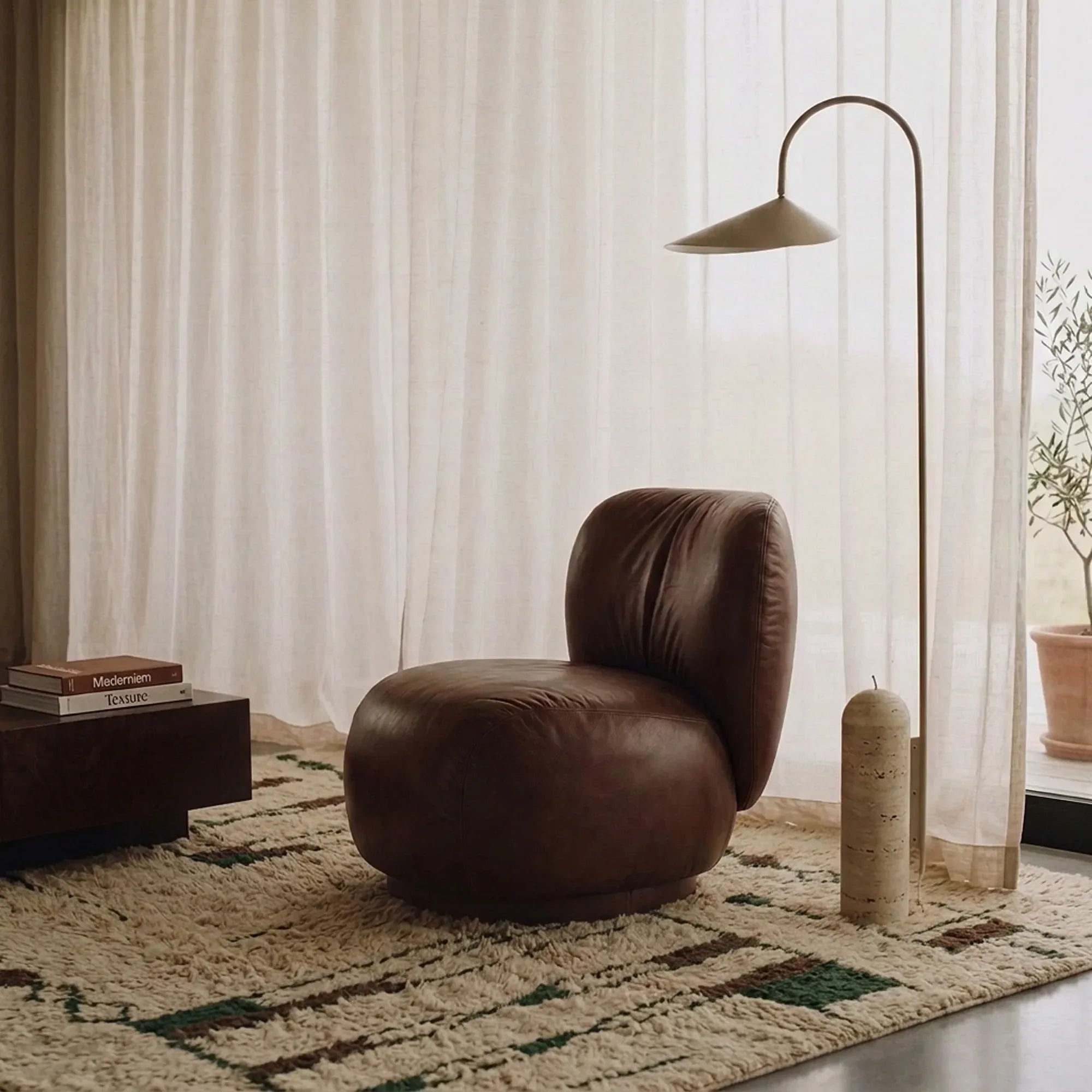Tinmel ivory, brown and olive Beni Ourain rug styled in a refined living room.