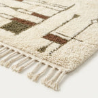Angled view of the Tinmel hand-knotted Beni Ourain rug.