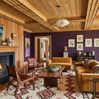 Ivory and burgundy Azilal rug styled in a neutral living room