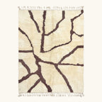 Full view of the Mazigh ivory and burgundy Beni Ourain rug with a branch line design.