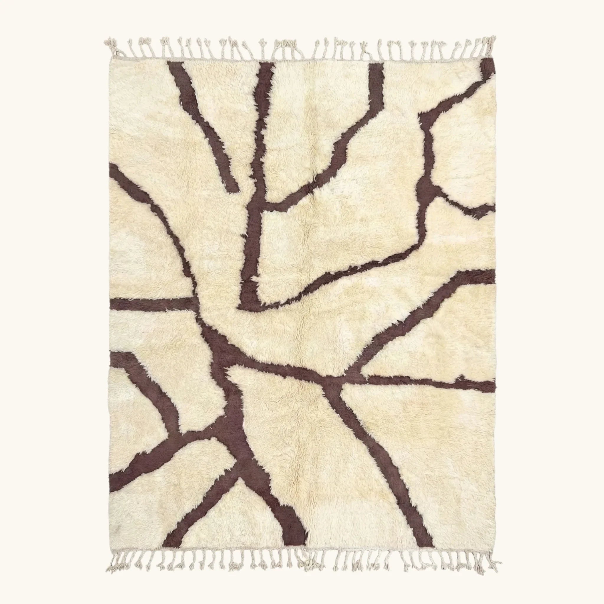 Full view of the Mazigh ivory and burgundy Beni Ourain rug with a branch line design.