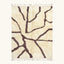 Full view of the Mazigh ivory and burgundy Beni Ourain rug with a branch line design.