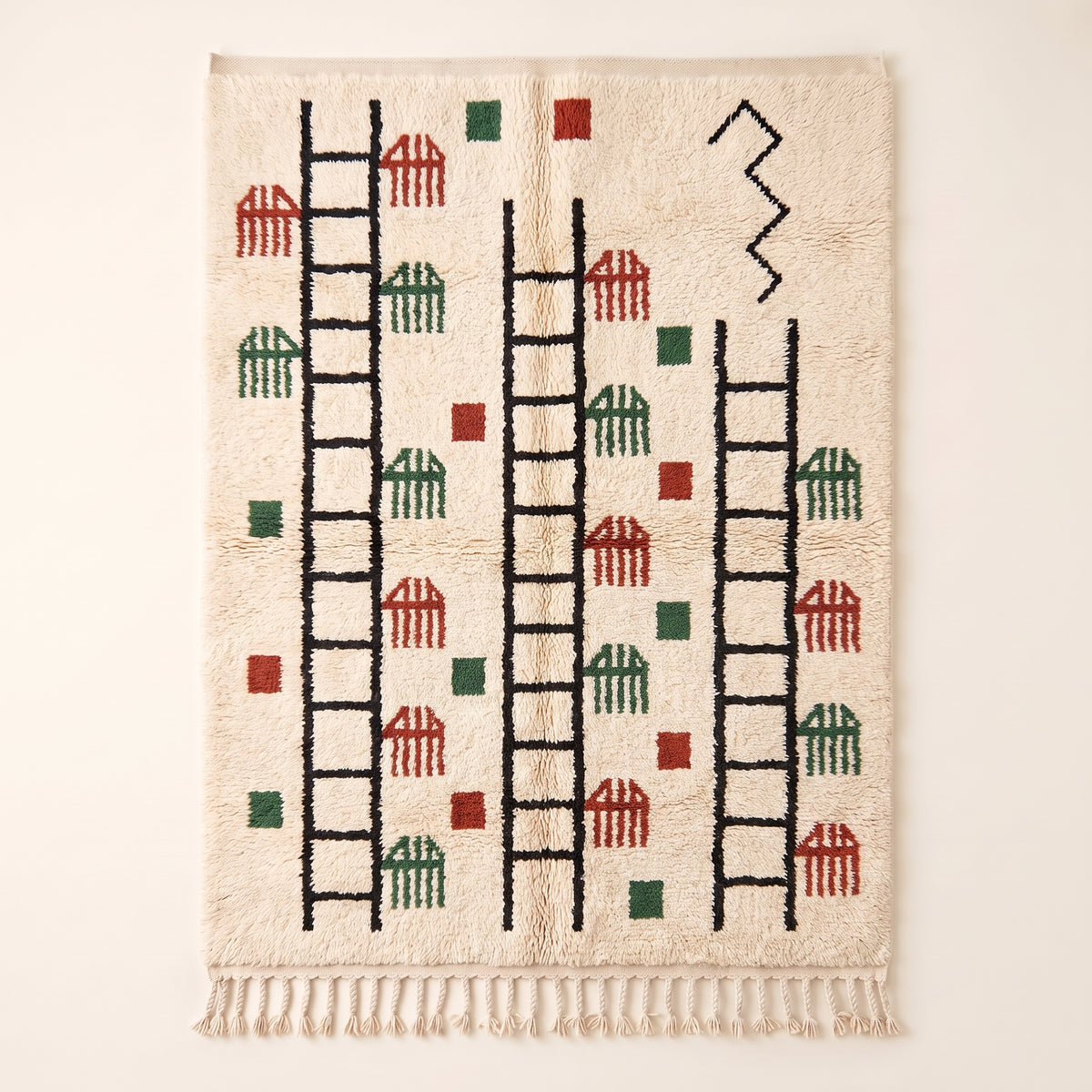 Ivory Beni Ourain rug with black ladder and zigzag motif, terracotta and forest green comb shapes scattered throughout, Ayyur design