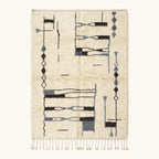 Full view of the Amun ivory, navy and black Beni Ourain rug with an abstract linear design.
