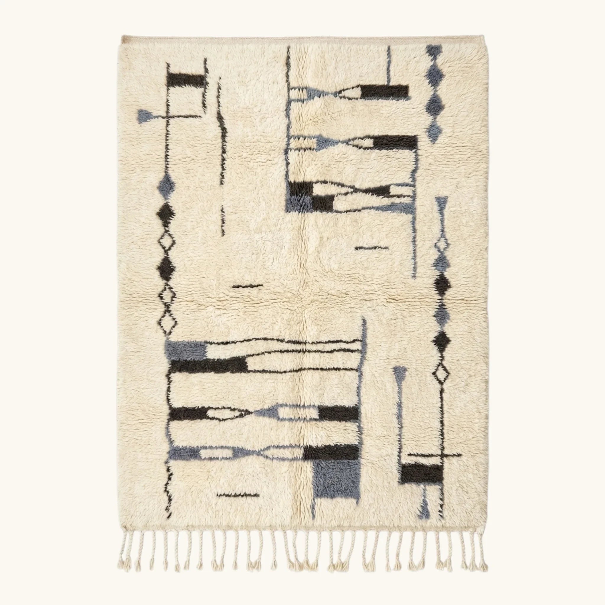 Full view of the Amun ivory, navy and black Beni Ourain rug with an abstract linear design.