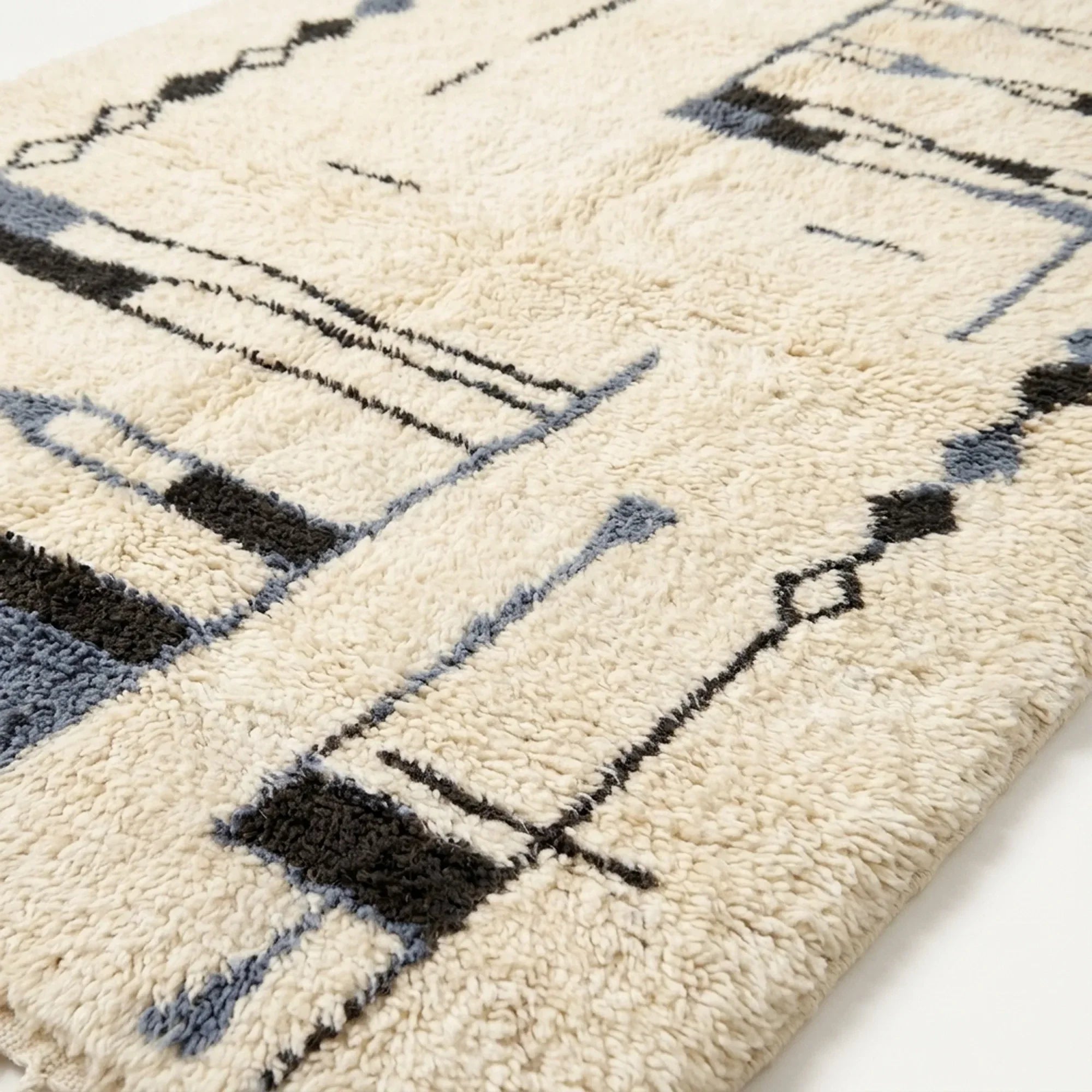 Angled view of the Amun hand-knotted Beni Ourain rug.