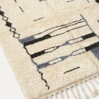 Fringe and edge detail of the Amun hand-knotted rug.