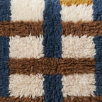 Close-up of the column weave pattern on the Tamda Moroccan wool pillow