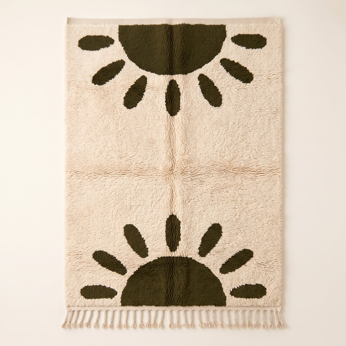 Ivory and olive Beni Ourain rug with sun motif, full flat view