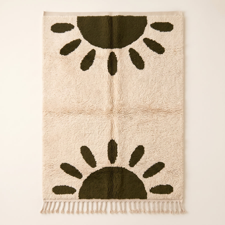 Ivory and olive Beni Ourain rug with sun motif, full flat view