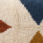 Close-up of the three triangles pattern on the Tagant Moroccan wool pillow