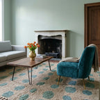 Taddart ivory and sage green Beni Ourain rug styled in a refined interior.