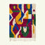 Full view of the Amzagh Boujaad rug in magenta, cobalt, mustard, green and cream with bold abstract ribbon shapes