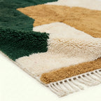 Emerald & Mustard Mrirt rug Tazdur, organic forms edge detail