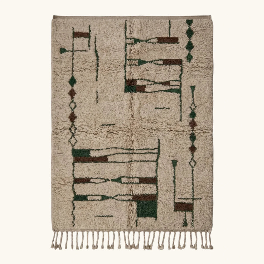 Full view of the Tafra mushroom, forest green and charcoal Beni Ourain rug with an abstract linear design.