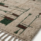 Close-up of the abstract linear pattern on the Tafra rug.