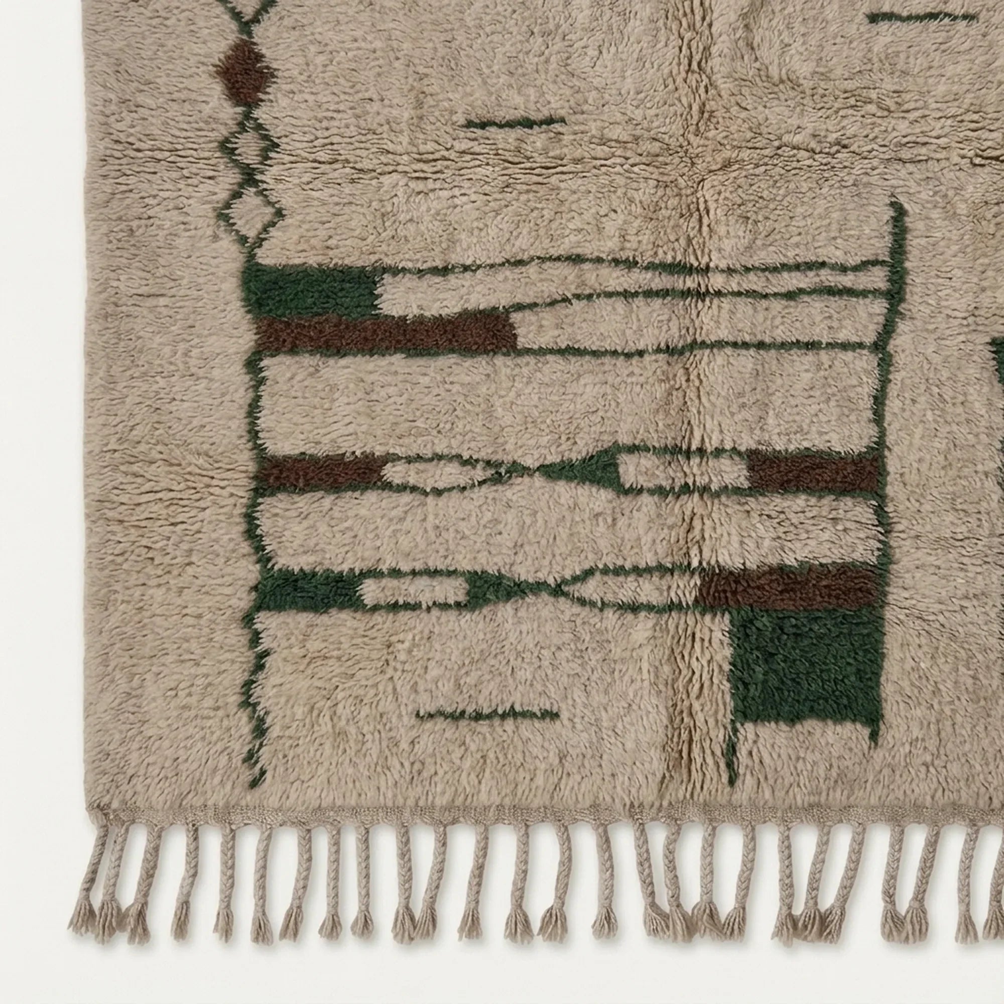 Close-up of the natural Atlas wool texture on the Tafra rug.