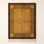Mustard and chocolate Mrirt rug with linear stripe column border design and solid centre, flat lay on neutral background