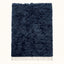 Navy Beni Ourain rug with soft textured monochromatic pile and cream fringe, full flat view