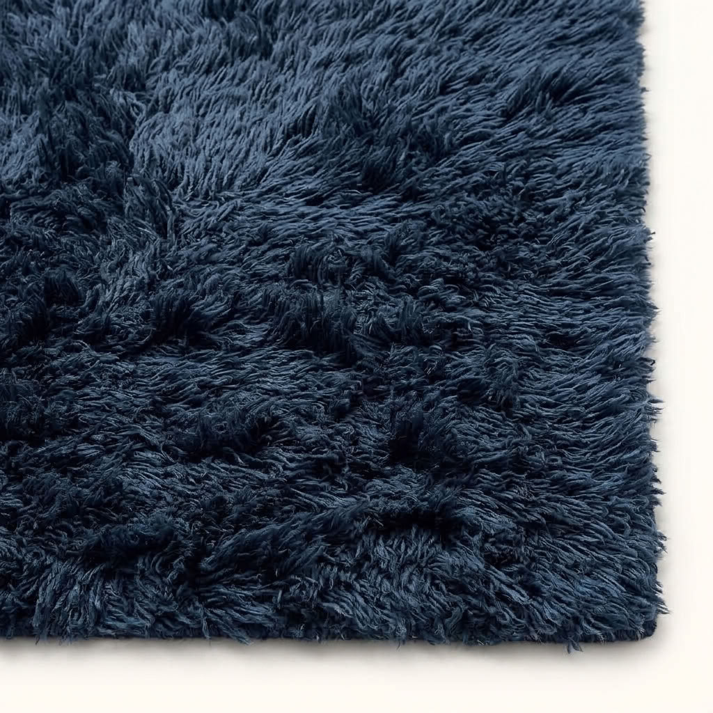 Close-up of navy Beni Ourain pile showing soft texture and tonal depth