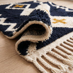 Rolled edge showing pile construction and ivory fringe detail