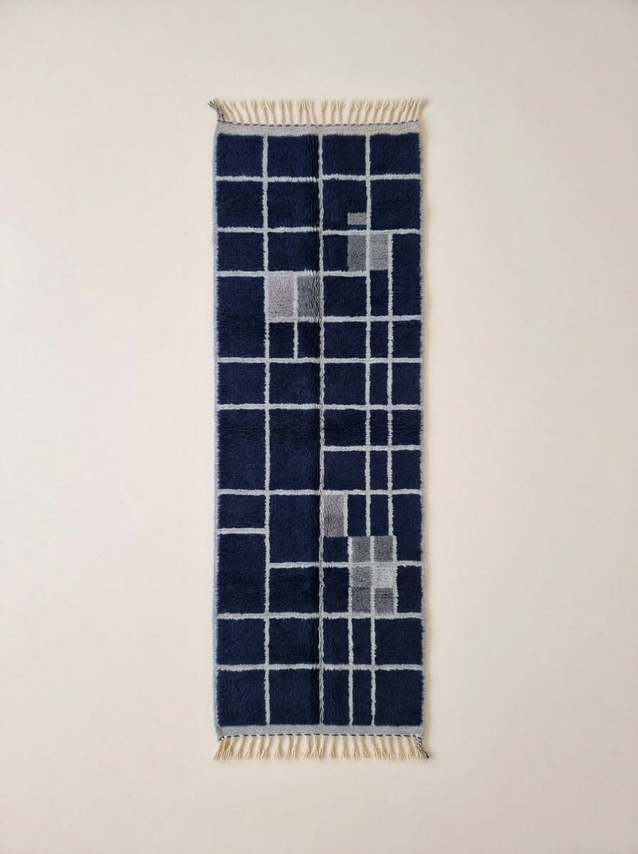 Navy and ivory Mrirt runner with grid check pattern, flat lay on white background