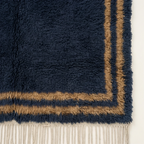 End view showing the double border design of the Isli Beni Ourain rug.