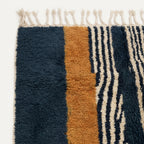 Angled view of the Tifrit hand-knotted Beni Ourain rug.
