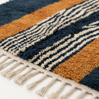 Fringe and edge detail of the Tifrit hand-knotted rug.