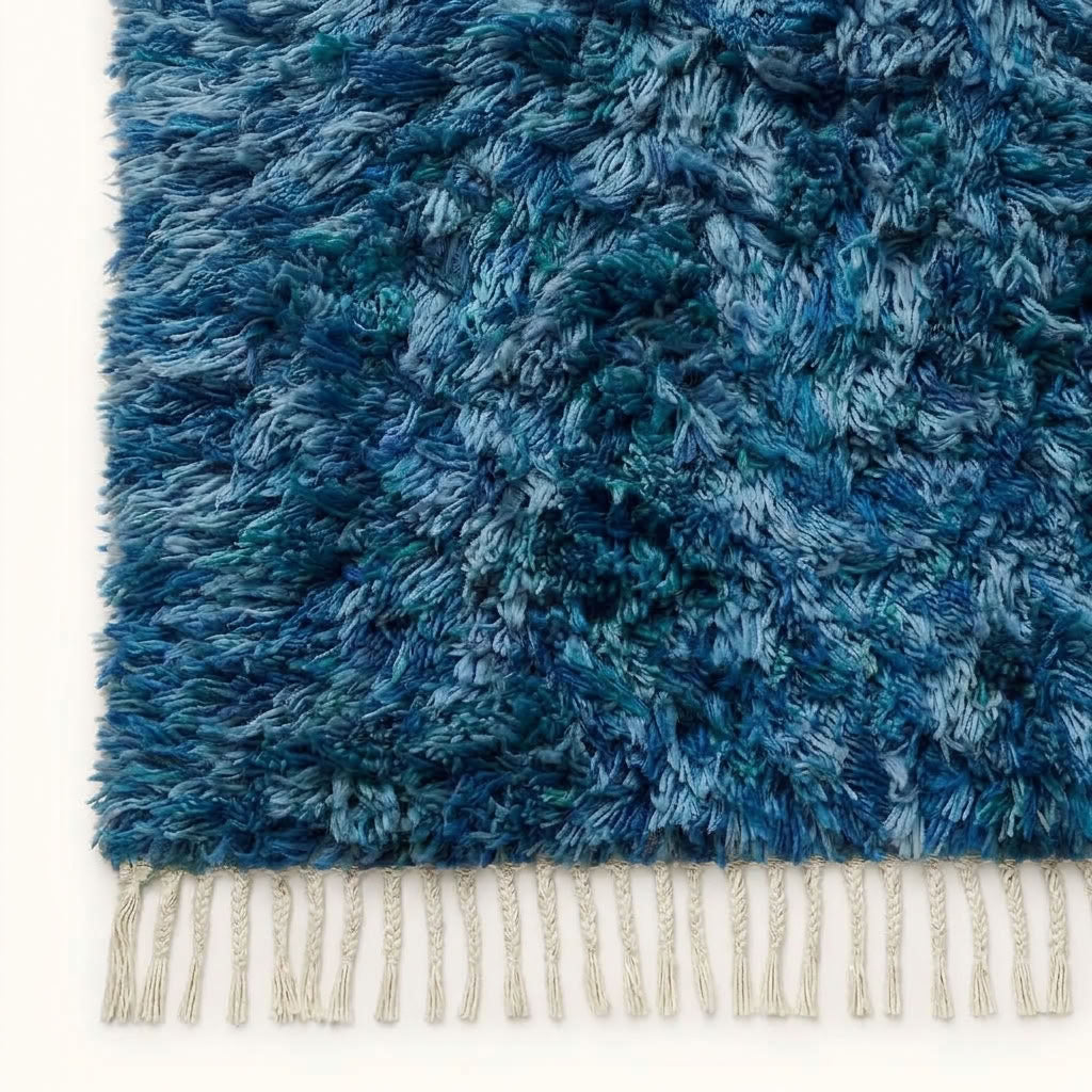 High-angle close-up of navy, pale blue and ivory hand-knotted wool texture on Beni Ourain rug Itri