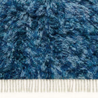 Close-up of navy, pale blue and ivory textured pile on Beni Ourain rug Itri showing diamond lattice detail