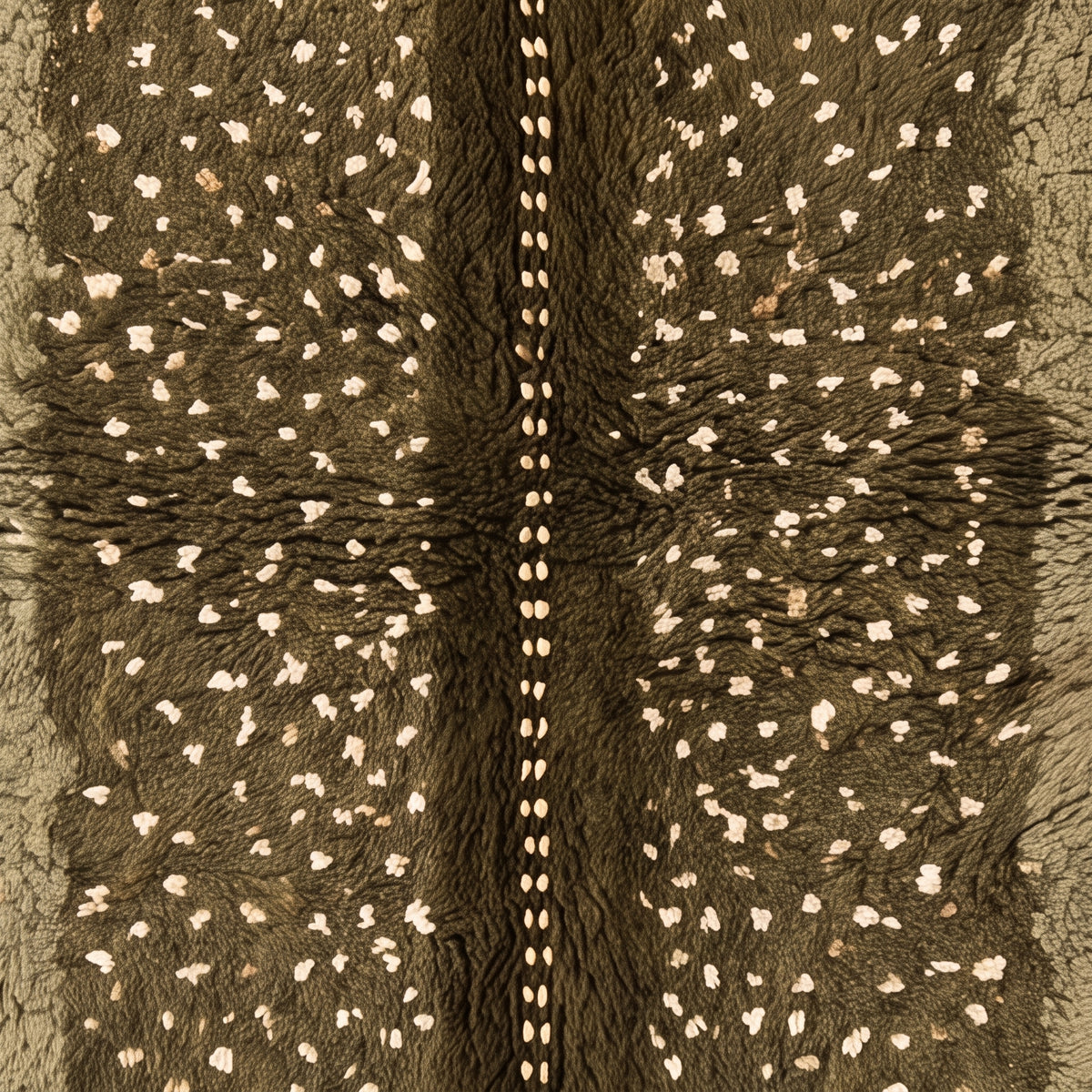 Central stripe detail showing fine white dot line separating olive and fawn sections of scattered dot pattern