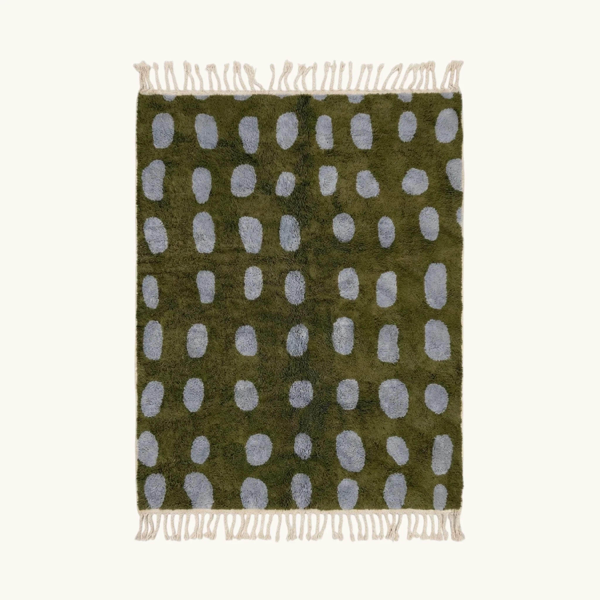 Full view of the Azil olive green and slate blue Beni Ourain rug with an oval grid design.