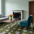 Azil olive green and slate blue Beni Ourain rug styled in a refined interior.