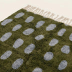 Additional full view of the Azil olive green and slate blue Beni Ourain rug.