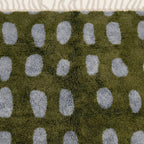 Close-up of the natural Atlas wool pile on the Azil olive green and slate blue Beni Ourain rug.