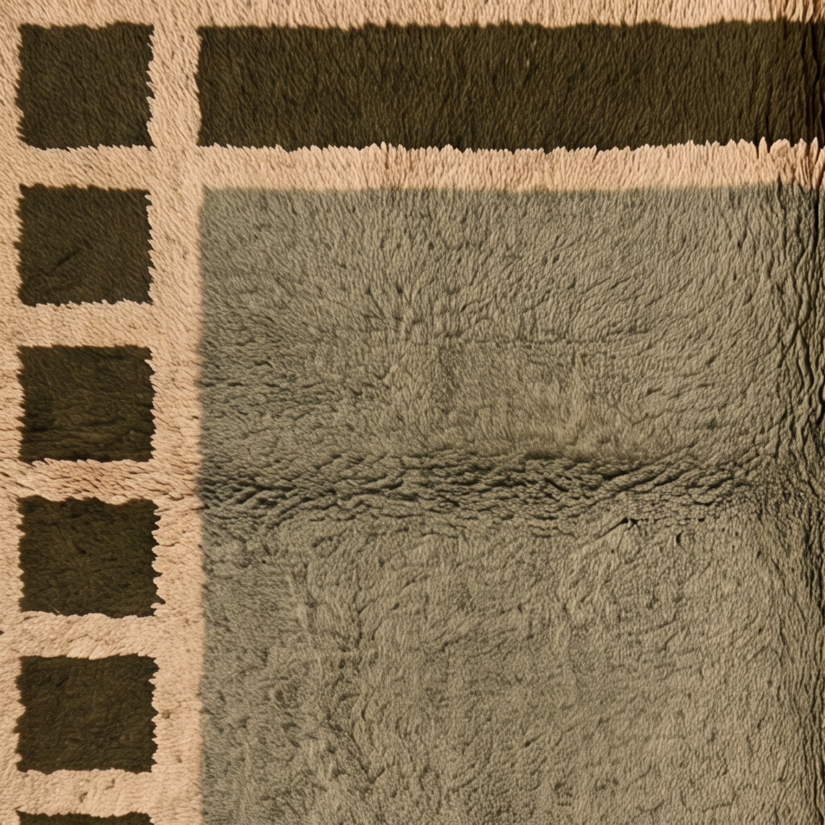 Side view of olive Mrirt rug showing dense plush pile and border frame