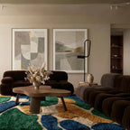 Teal & Navy Mrirt rug Tifara with organic color blocks, styled in a living room