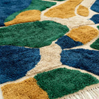 Teal & Navy Mrirt rug Tifara, organic color blocks raised pile detail
