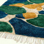 Teal & Navy Mrirt rug Tifara, organic color blocks edge detail